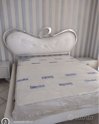 Letto matrimoniale ditta Corte Zari pelle