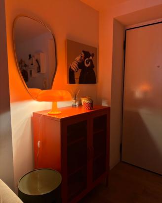 Artemide Nessino - lampada da tavolo arancione