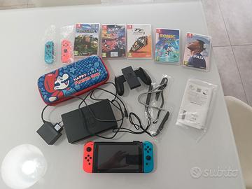 Nintendo switch  V2 + giochi + custodia super mari