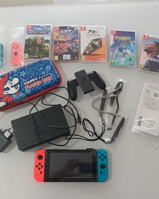 Nintendo switch  V2 + giochi + custodia super mari