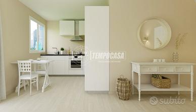 AMPIO MONOLOCALE CON BALCONE PIANO ALTO