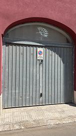 Portone basculante in lamiera zincata