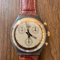 Swatch Chrono Goldfinger SCM100. Nuovo