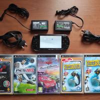 PSP 1004 FAT NERA CON 5 GIOCHI + 2 ALIMENTATORI