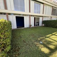 Ampio bilocale con veranda-giardinetto-uso piscina