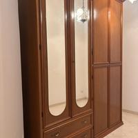 Camera da letto in legno noce