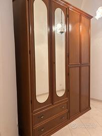 Camera da letto in legno noce