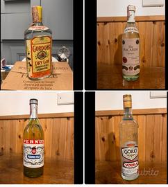 4 bottiglie vintage sigillate rum vodka gin pernod