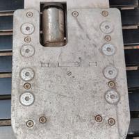 Piastra di ancoraggio per carrozzina auto disabili