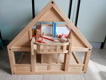 Casa bambole in legno con accessori ed arredamenti