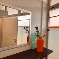 Specchio con cornice inox