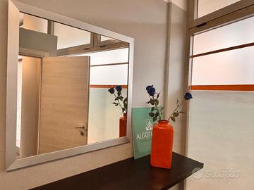 Specchio con cornice inox