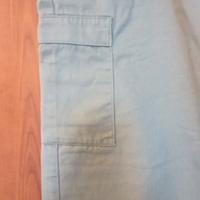 Pantalone con tasconi laterali