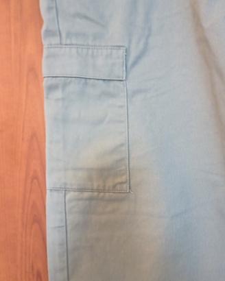 Pantalone con tasconi laterali