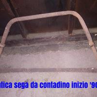 Antica sega, tenaglie. pinza per camino