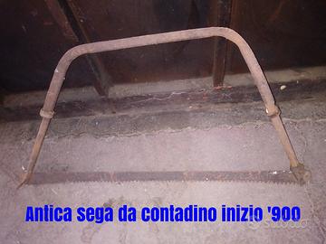 Antica sega, tenaglie. pinza per camino