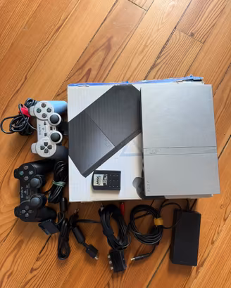 Playstation 2 con 25 giochi e 2 controllorer