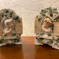Coppia di putti in ceramica inizio 900