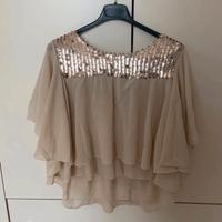 Blusa con paillettes Akè