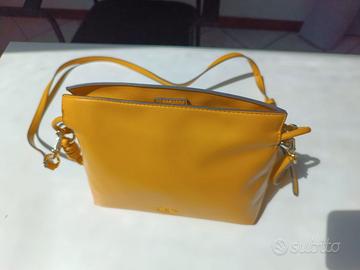 Borsa Motivi gialla effetto pelle – elegante