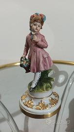 Statuina bambina con fiori Capodimonte Tyche Tosca