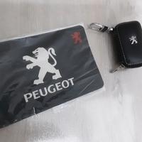 Accessori Peugeot tappetino + portachiavi/cofanett