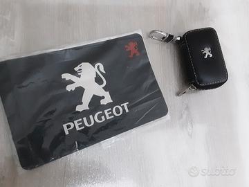 Accessori Peugeot tappetino + portachiavi/cofanett