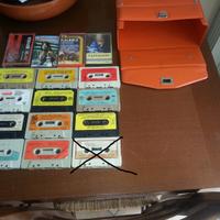 16MusicassettePiù1BorsaPortaMusicassetteArancioUsa