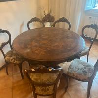Tavolo rotondo in legno con 6 sedie