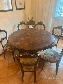 Tavolo rotondo in legno con 6 sedie