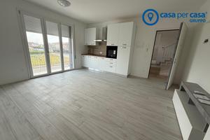 Bilocale con giardinetto e garage