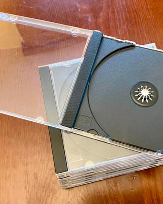 10 Custodie CD / DVD nere + 1 trasparente in omagg