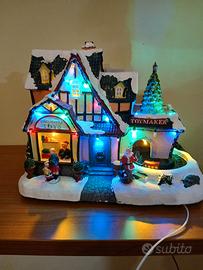 Villaggio natalizio casa con babbo natale 