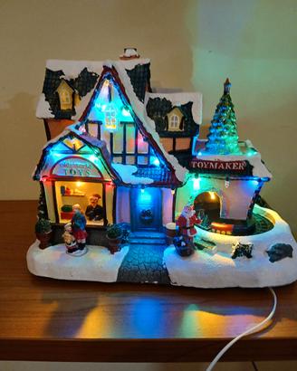 Villaggio natalizio casa con babbo natale 