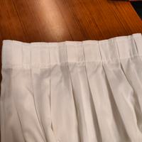 Tenda bianca confezionata.