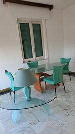 sala da pranzo  design vetro e legno