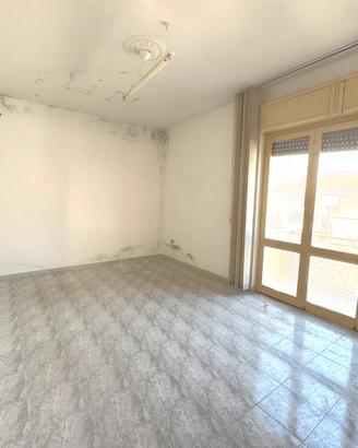 Ampio appartamento con balconi e soffitta
