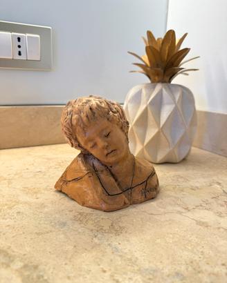 Busto di ragazzo di Enzo Marinelli