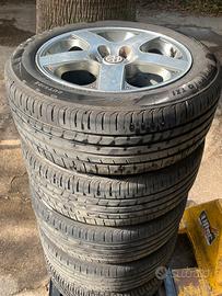 4 cerchi VW GOLF IV  con gomme seminuove dot 0125