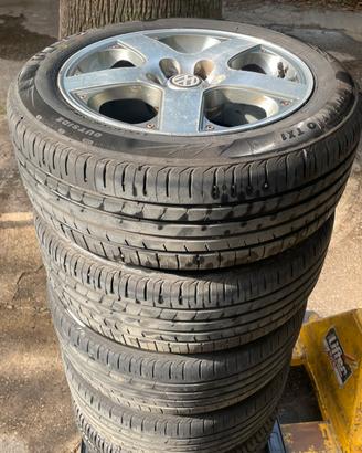 4 cerchi VW GOLF IV  con gomme seminuove dot 0125