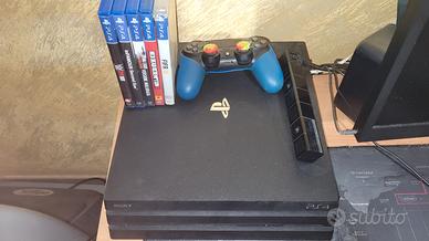 PS4 PRO + PAD + PS CAMERA + GIOCHI