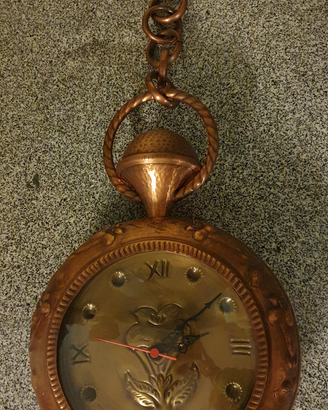 Orologio da parete con struttura in rame