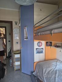 Letto a castello con ribalta e cabina armadio