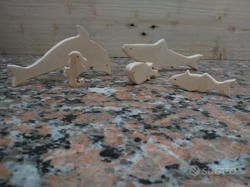 Giocattoli Pesci stilizzati in legno fatto a mano