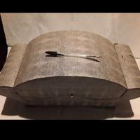 Bambinello in cera con carillon 