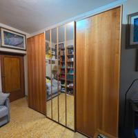 Armadio 4 stagioni con porte scorrevoli e spdcchio