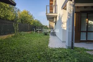 TRILOCALE CON GIARDINO IN RESIDENCE CON PISCINA