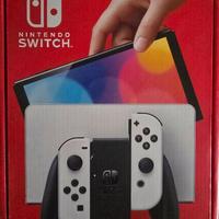 Nintendo Switch OLED + accessori + gioco
