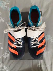 Scarpe chiodate salto deals in alto