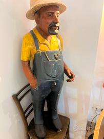 Statua contadino vintage